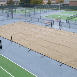 How Sports Tarpaulins Protect UK Grounds from Weather Damage
